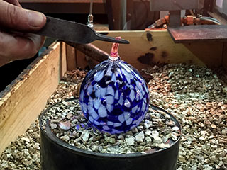 Cutting and Twisting Glass To Form A Hanging Loop